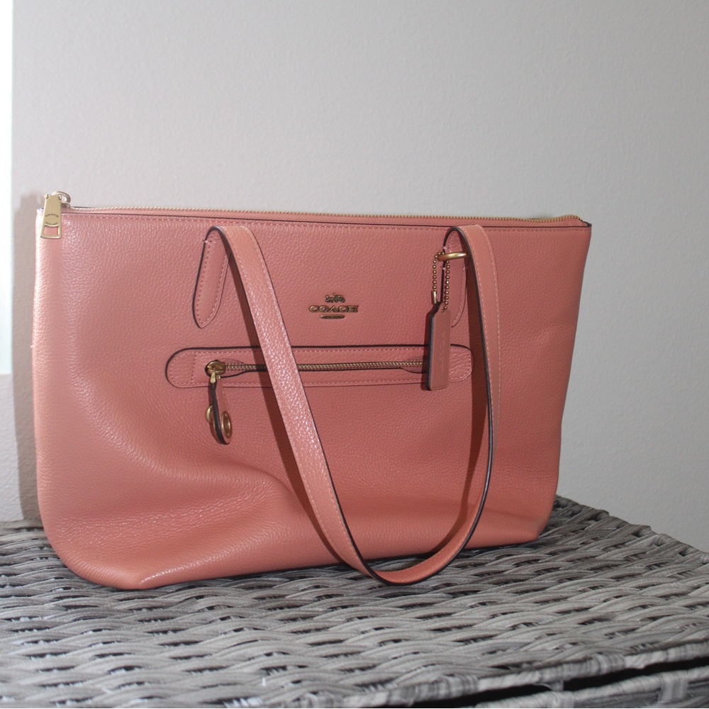 Salmon pink coach purse